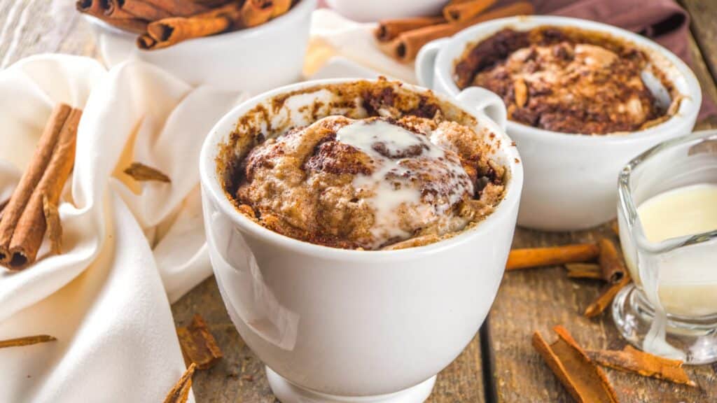 Cinnamon mug cake with cream topping