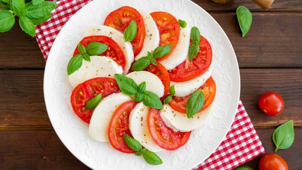 Caprese salad with tomatoes, mozzarella, and basil