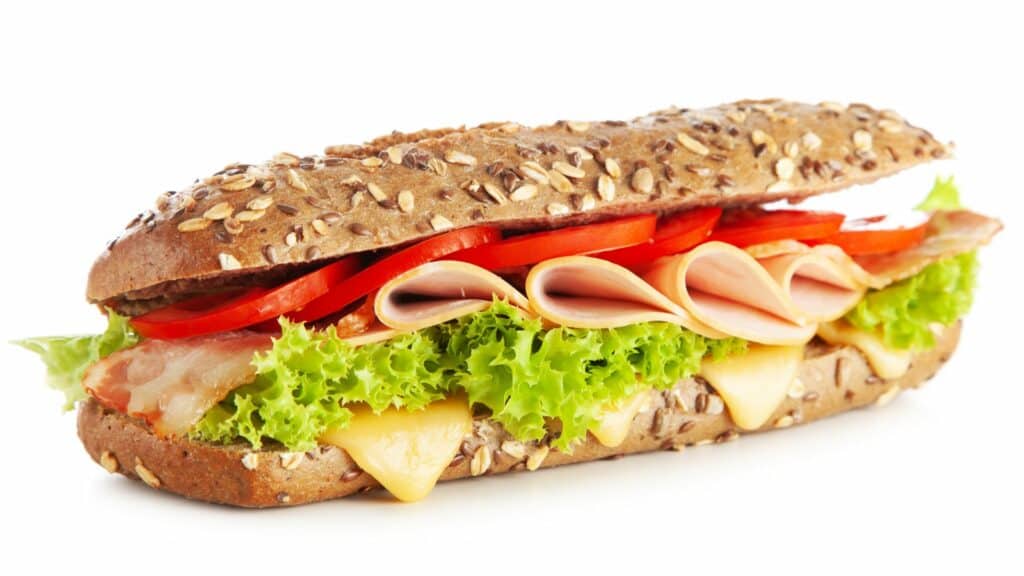Whole grain sandwich with turkey, lettuce, and tomato