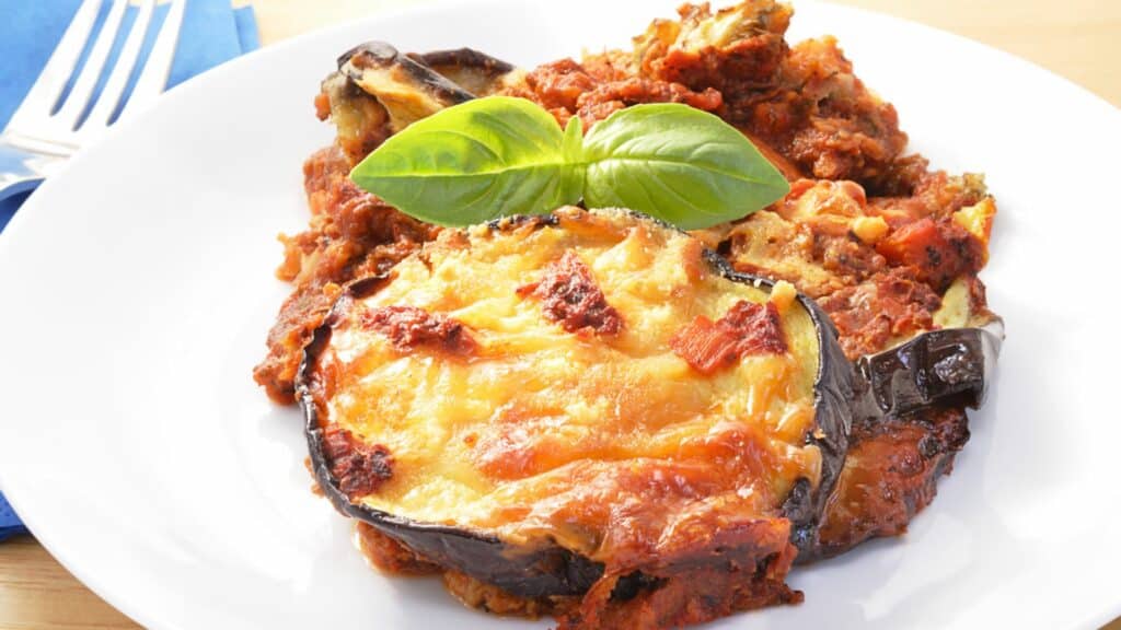 Eggplant parmesan with basil garnish
