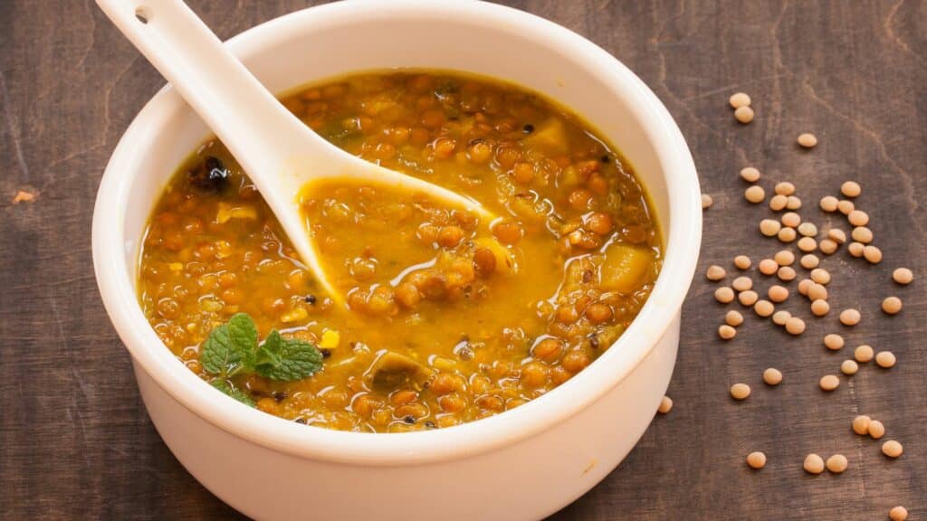 Bowl of lentil soup with spoon