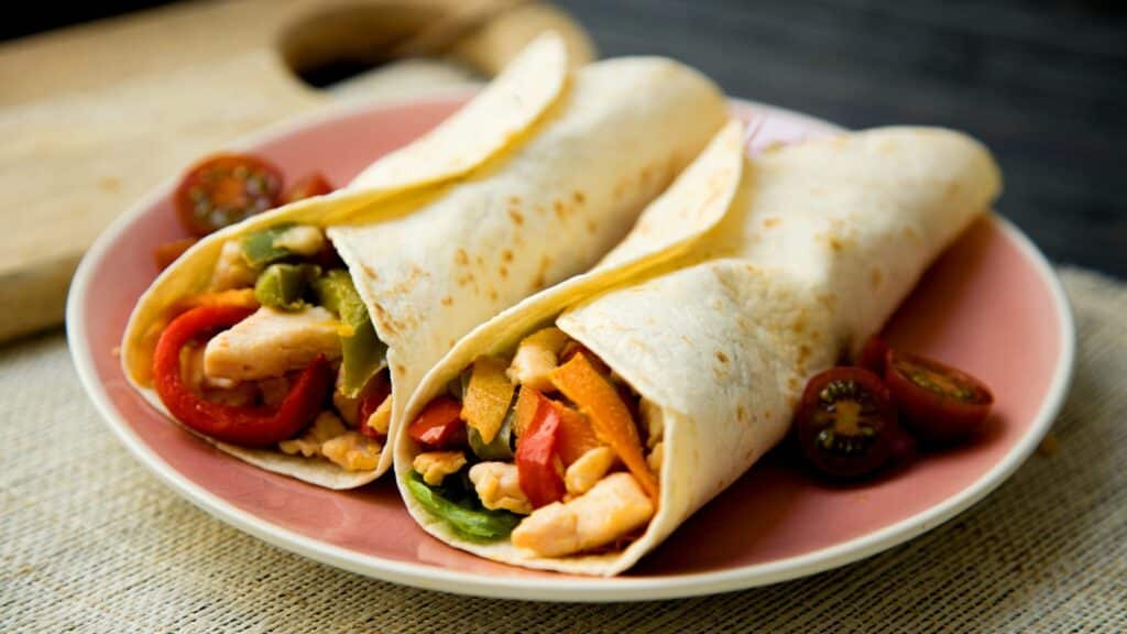 Chicken wraps with vegetables on a plate